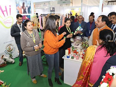 Visitors shopping for consumer products at a UKITEX stall