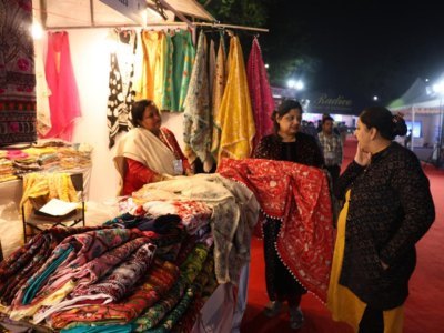 Handloom shawls and textiles at an expo stall
